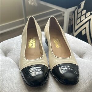 Salvatore Ferragamo Black and Cream Flats Timeless Elegance